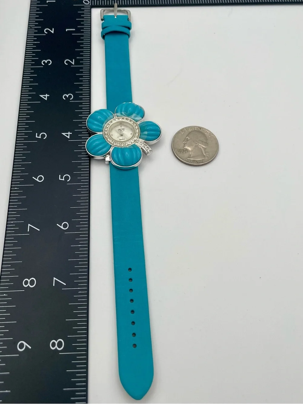Suzanne Somers Turquoise Flower Watch with Rhinestone Bezel. Blue Leather Band